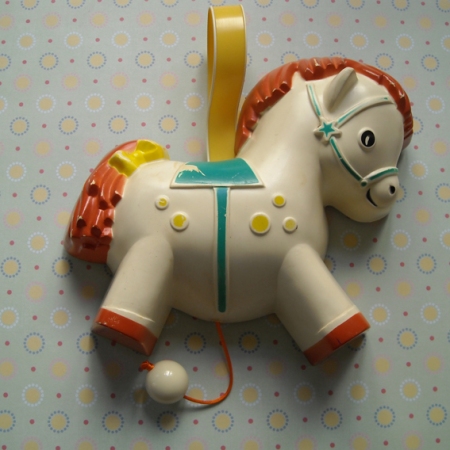 This is my best item - it is a 1968 Fisher Price musical pony. He needed a bit of repair which I bravely undertook and now he lives again. I think the Bakelite bead which I found to complete the job rocks! 